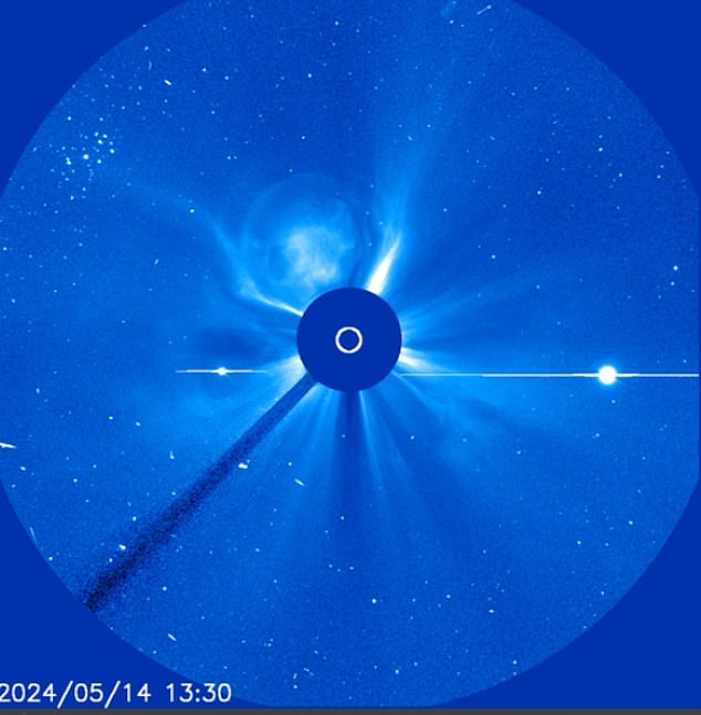 The powerful X-class flare erupted a little more than two hours before the sun hit, as power outages hit the US.